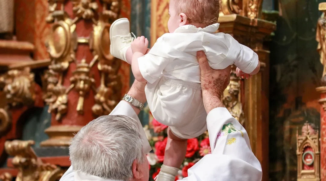 Child Baptized At Evening Glory By Chief Priest